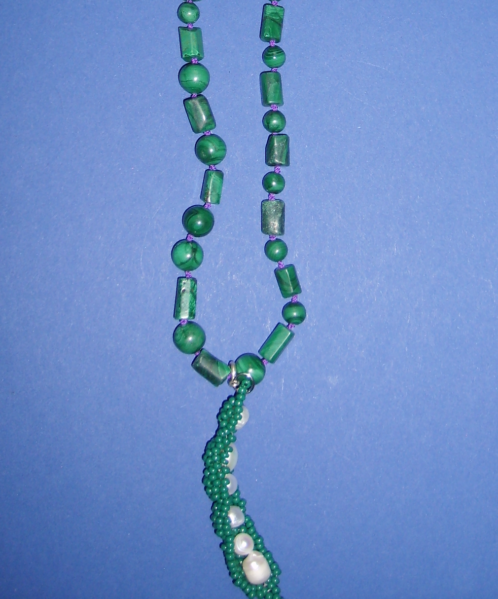 Malachite necklace with young peas