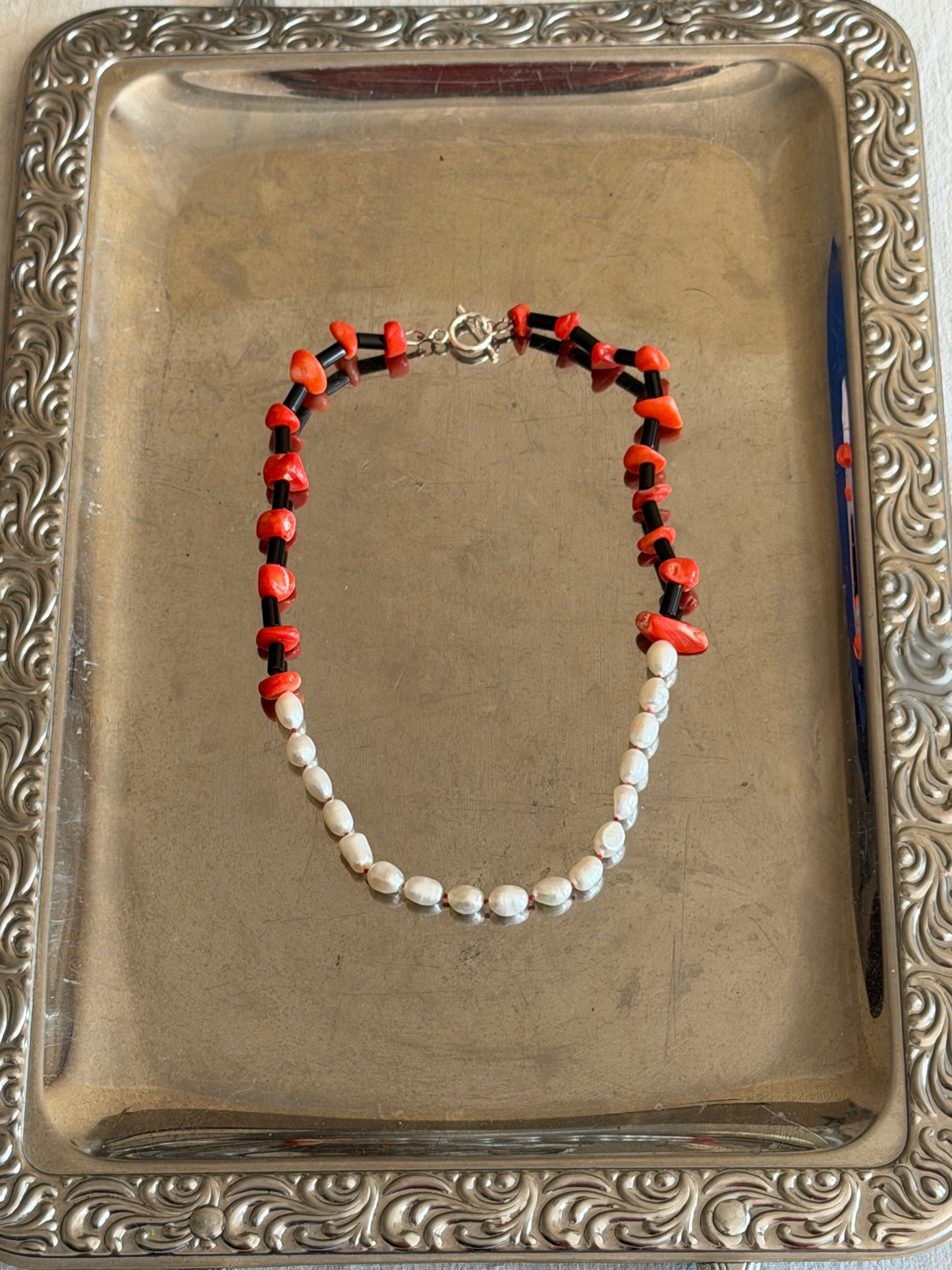 Pearl, onyx, coral necklace