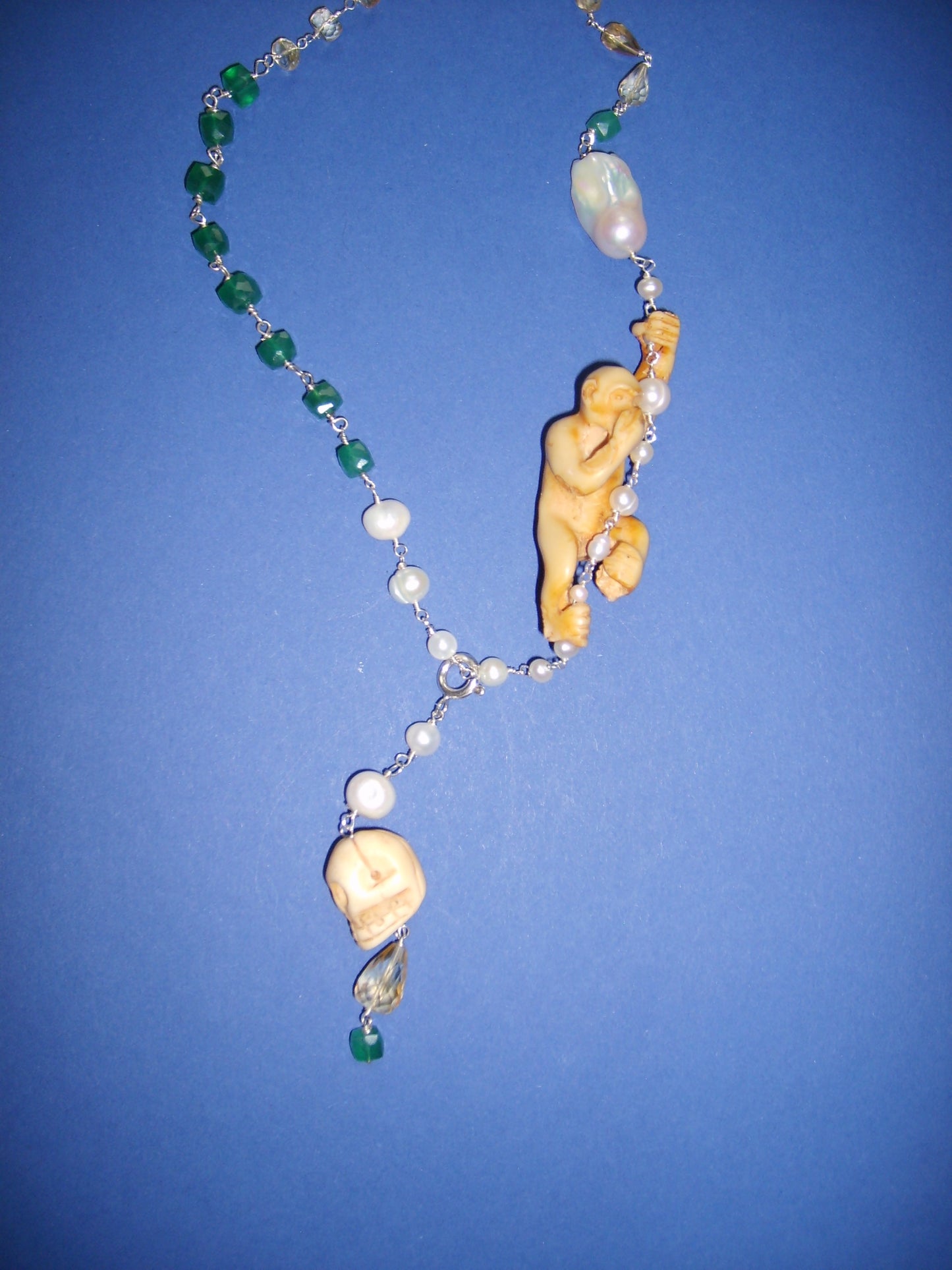 Necklace with a monkey