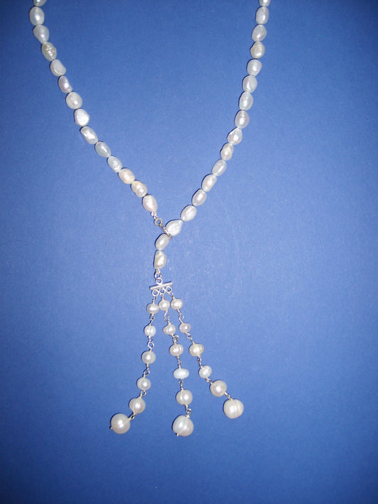 Pearl necklace with a pearl tassel