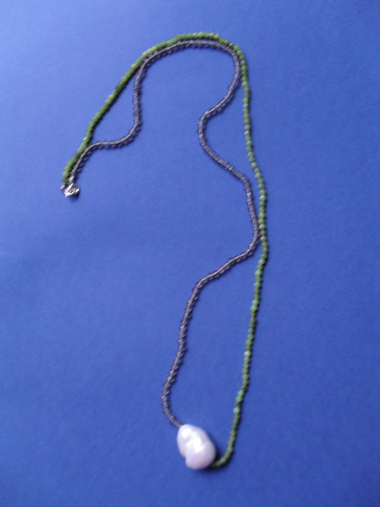 Necklace of amethyst, tsavorite and baroque pearl