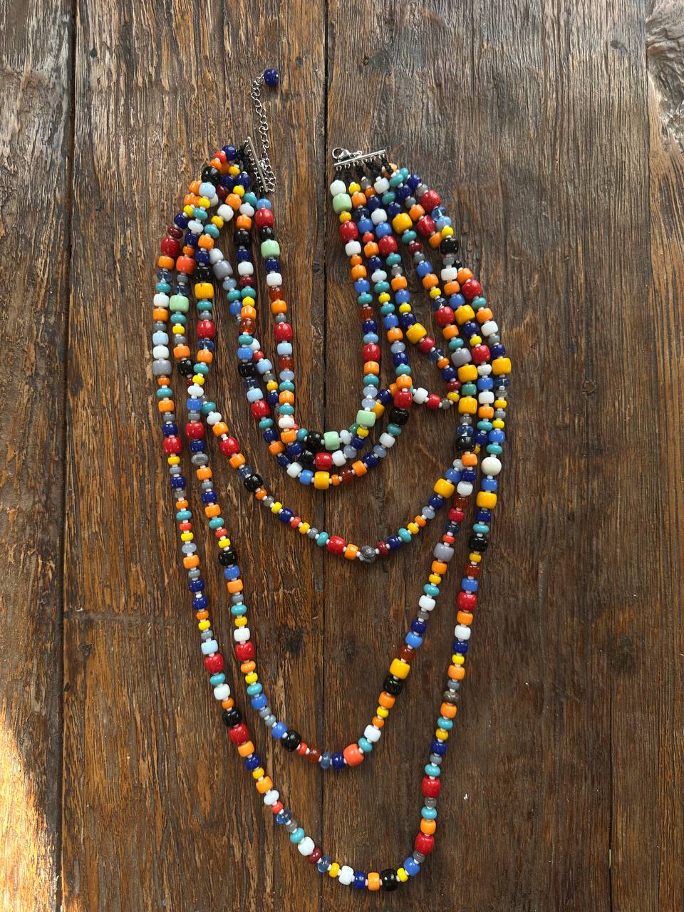 Multilayer necklace made of plastic beads