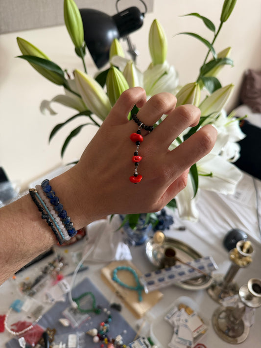 Coral tiny tassel ring