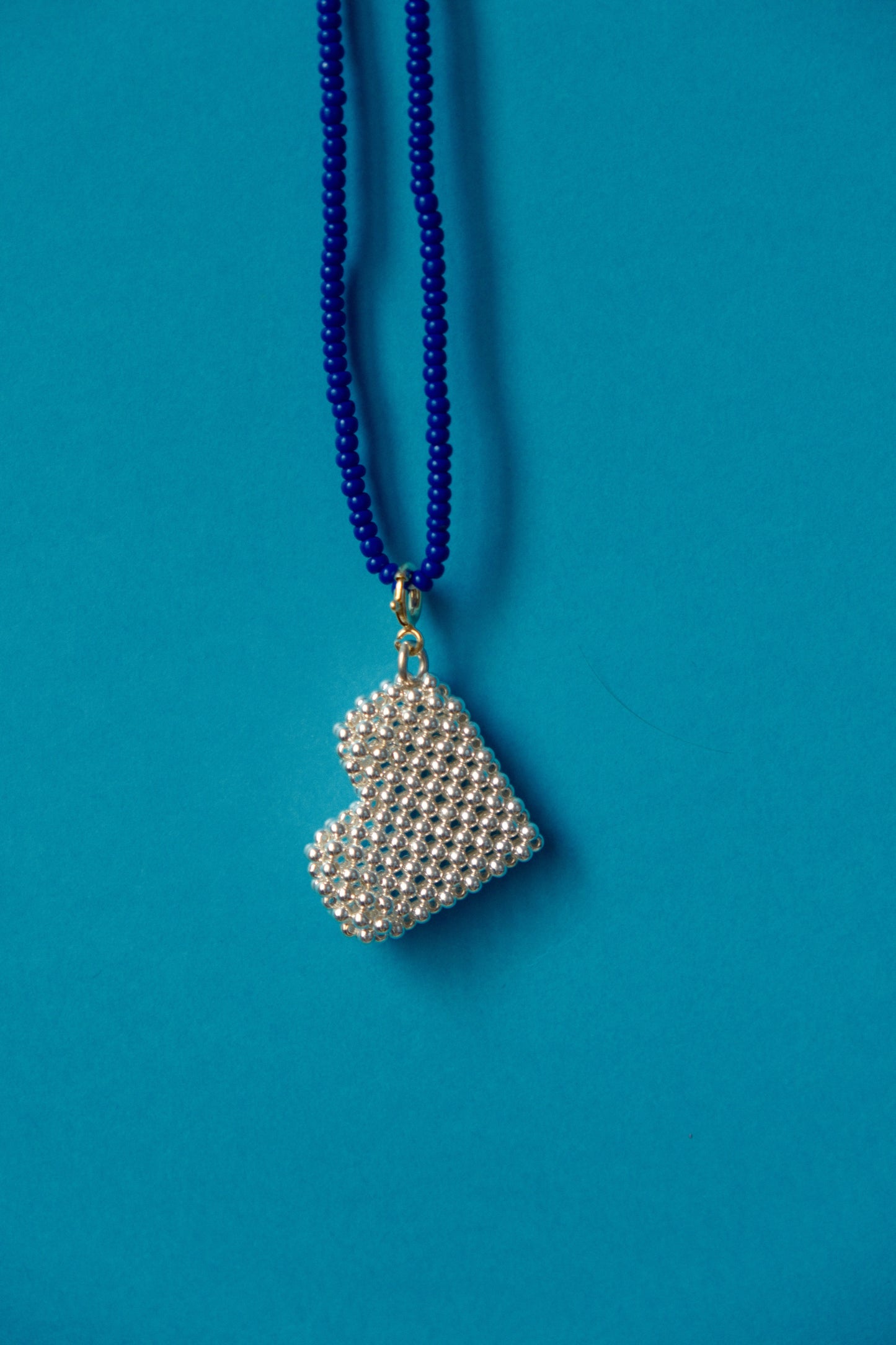 Silver heart charm