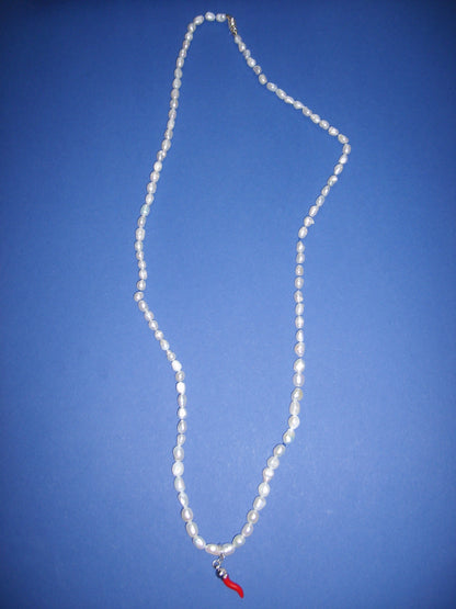 Pearl necklace with pepper charm