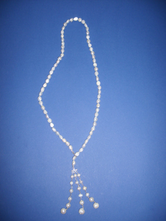 Pearl necklace with a pearl tassel