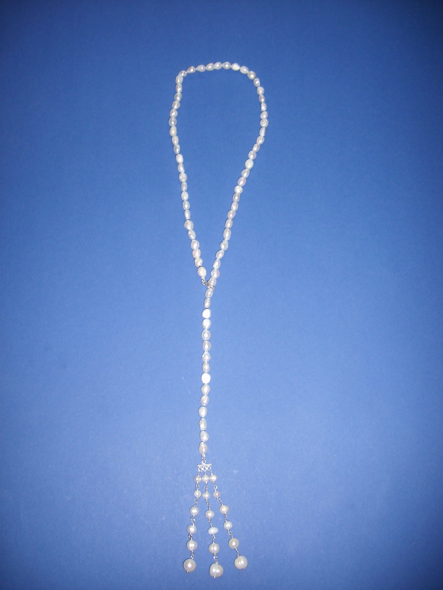 Pearl necklace with a pearl tassel