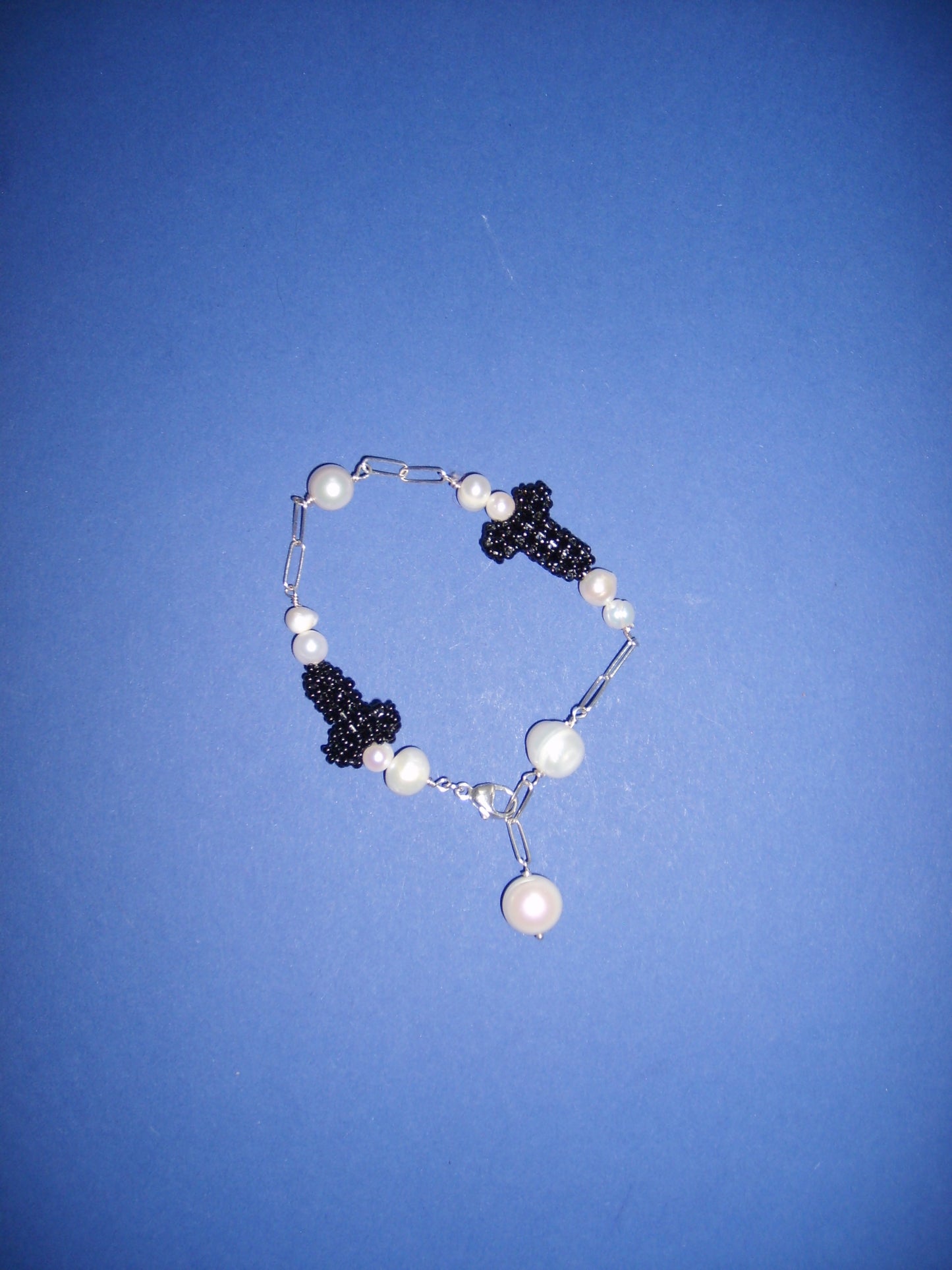 Silver bracelet with pearls and beaded dicks