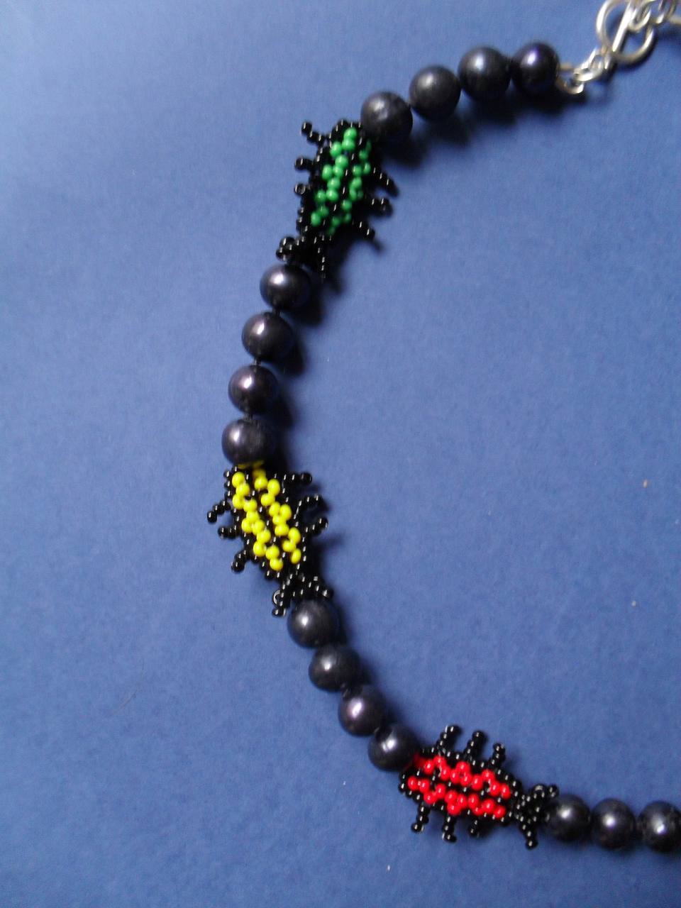 Necklace with beetles made of beads