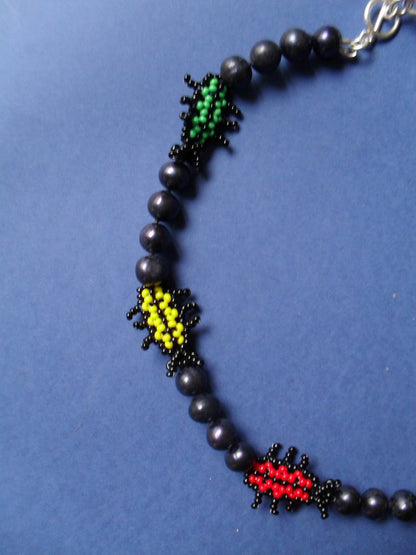 Necklace with beetles made of beads