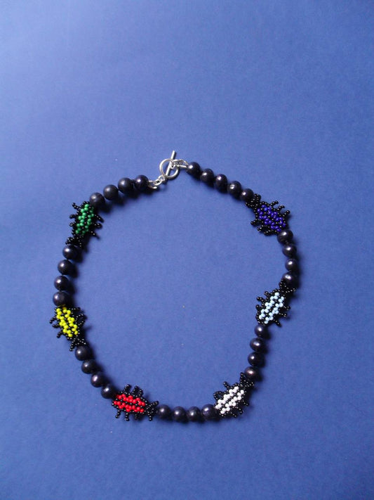 Necklace with beetles made of beads