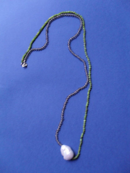 Necklace of amethyst, tsavorite and baroque pearl