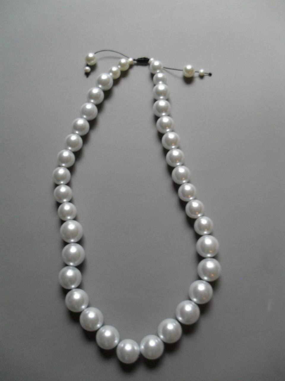 Necklace of large artificial pearls