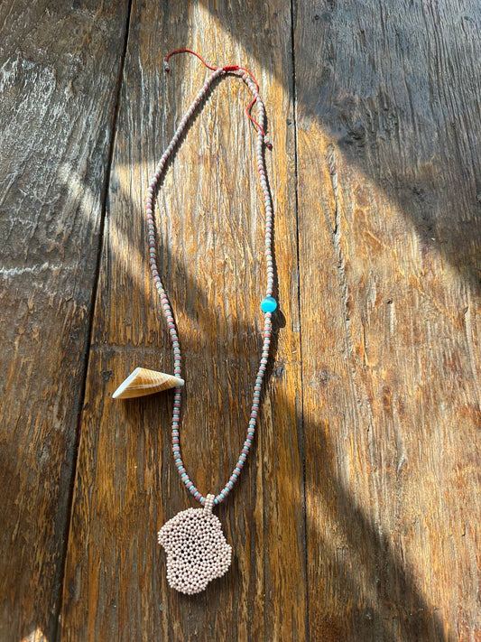 Long necklace with decorative elements