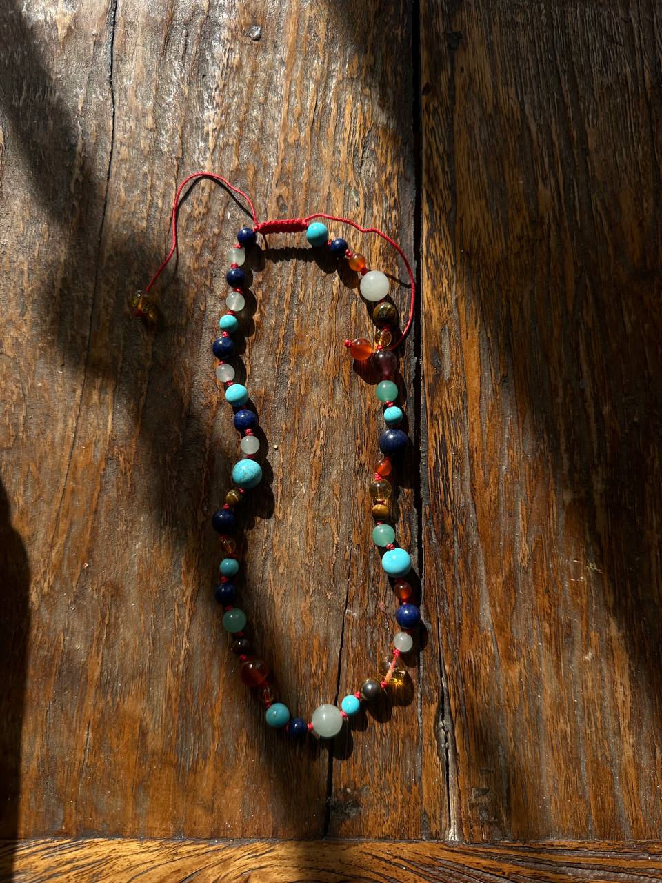 Necklace made of multi-colored beads