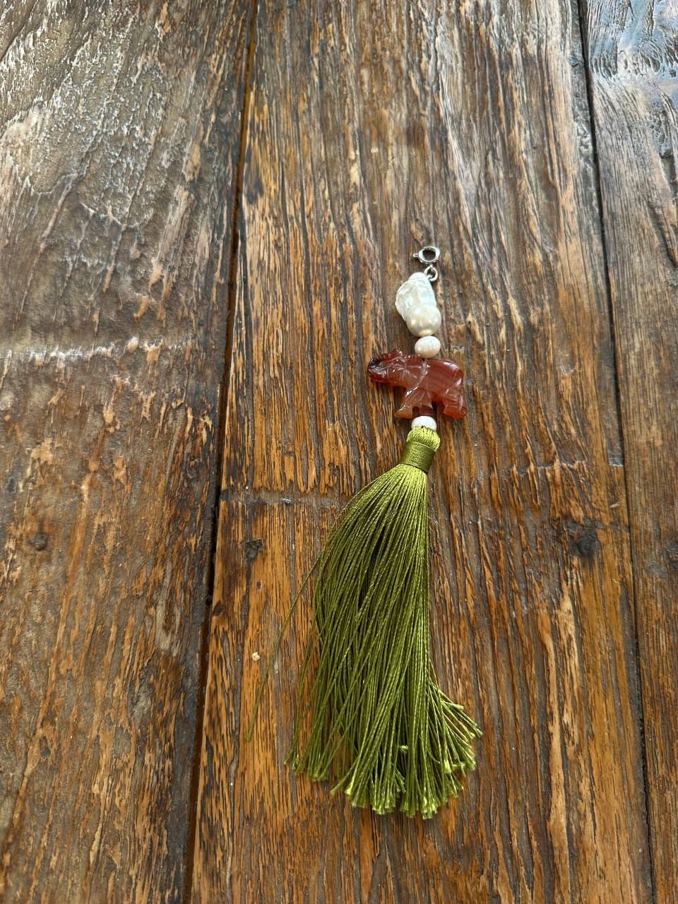 Green tassel charm with an elephant and a baroque pearl