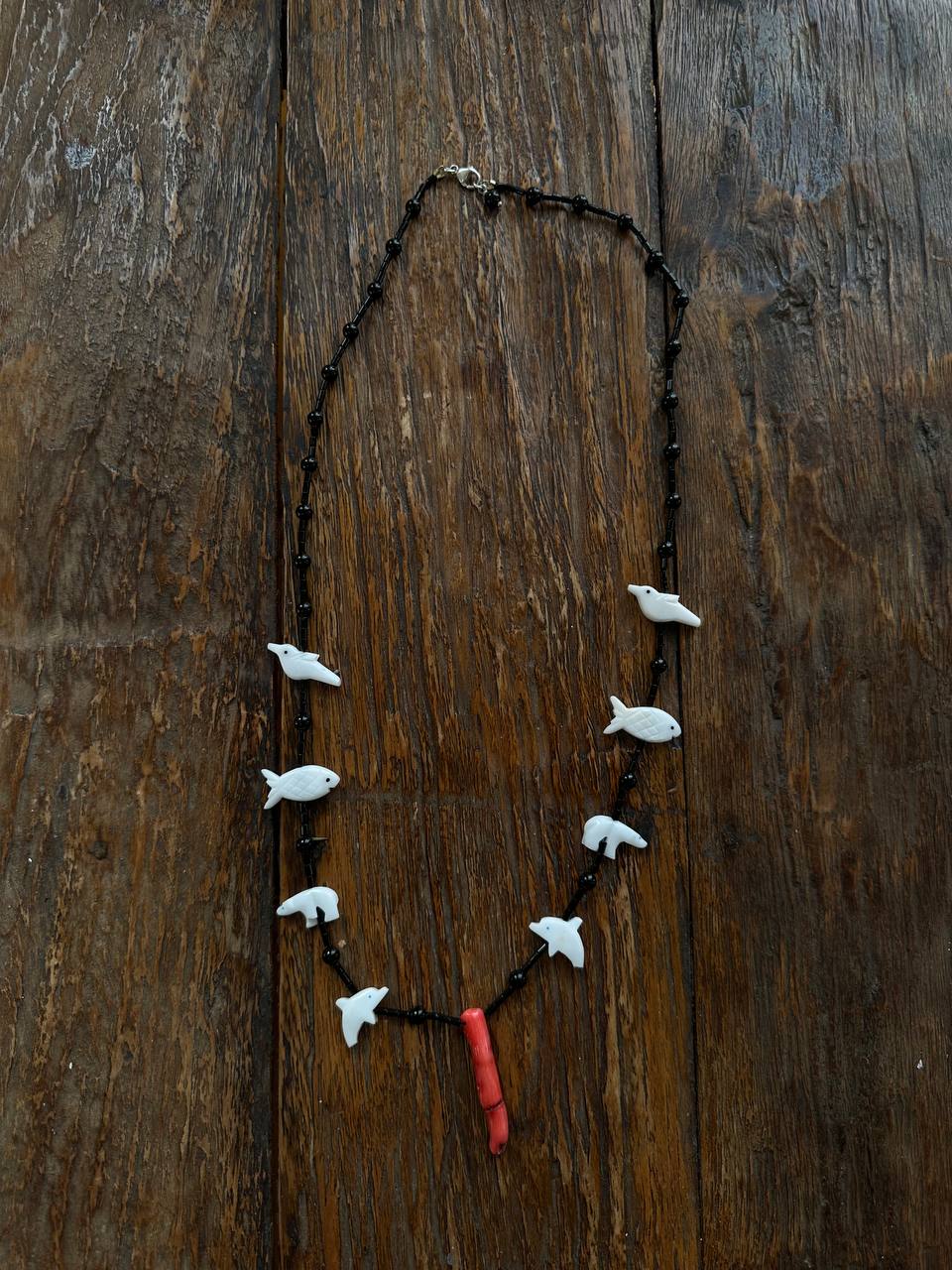 Black onyx necklace with coral and animal figures