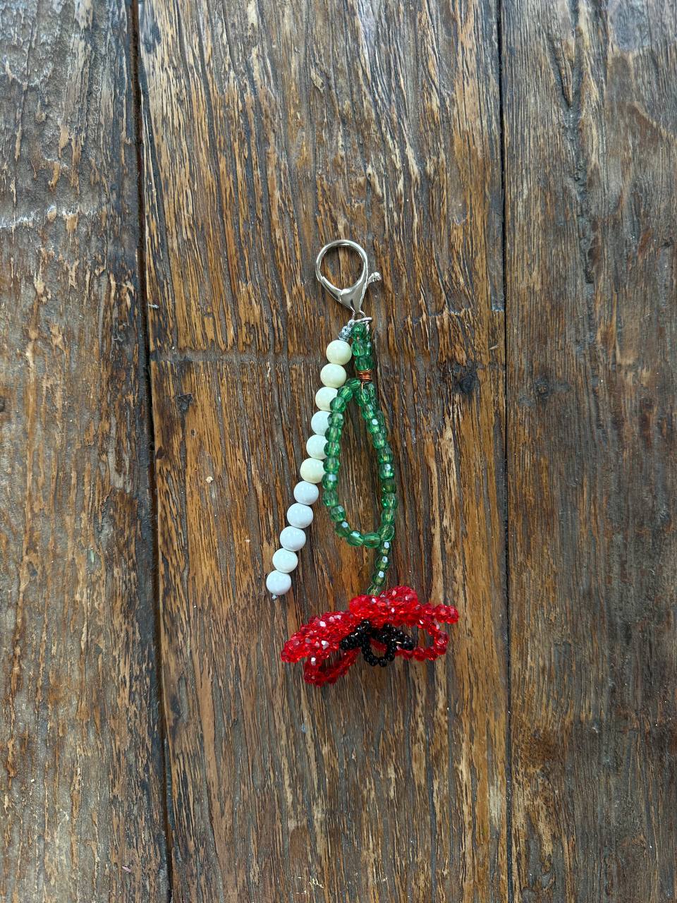 Key-ring with red  flower and beads