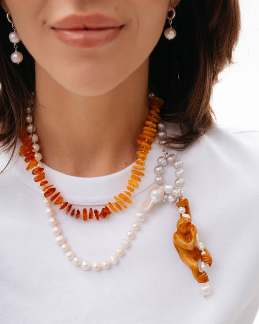 Pearl and amber Necklace with a monkey